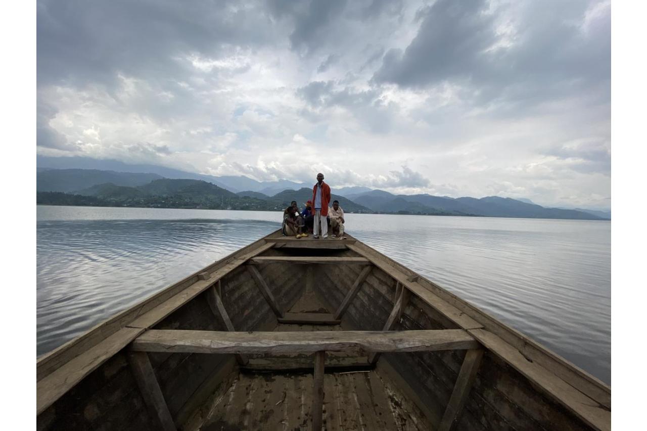 People standing on a boat on Lake Kivu in the DRC.