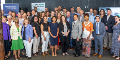 Grant holders stand for a group photo